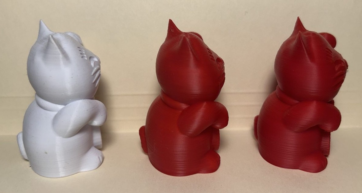 The three lucky cat prints viewed from the left