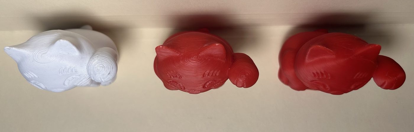 The three lucky cat prints viewed from above